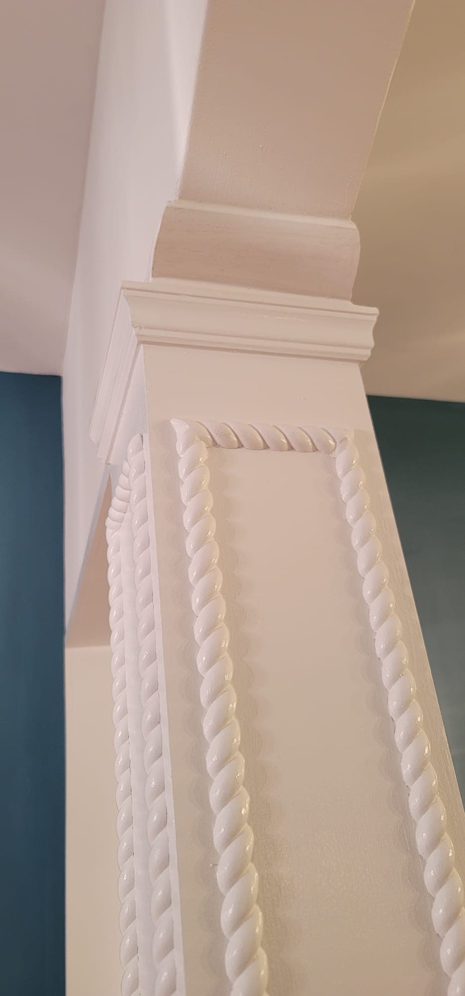 Interior finish carpentry detail — rope-molding column with wainscoting panel close-up, Rockland County NY