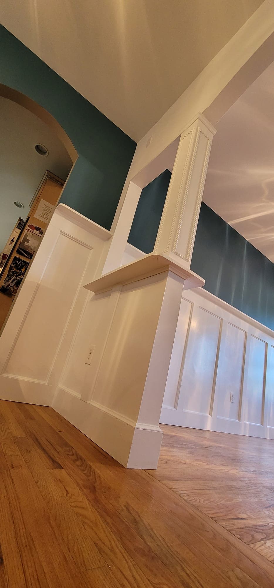 Interior remodeling — wainscoting column and hardwood floor viewed at low angle, Rockland County NY