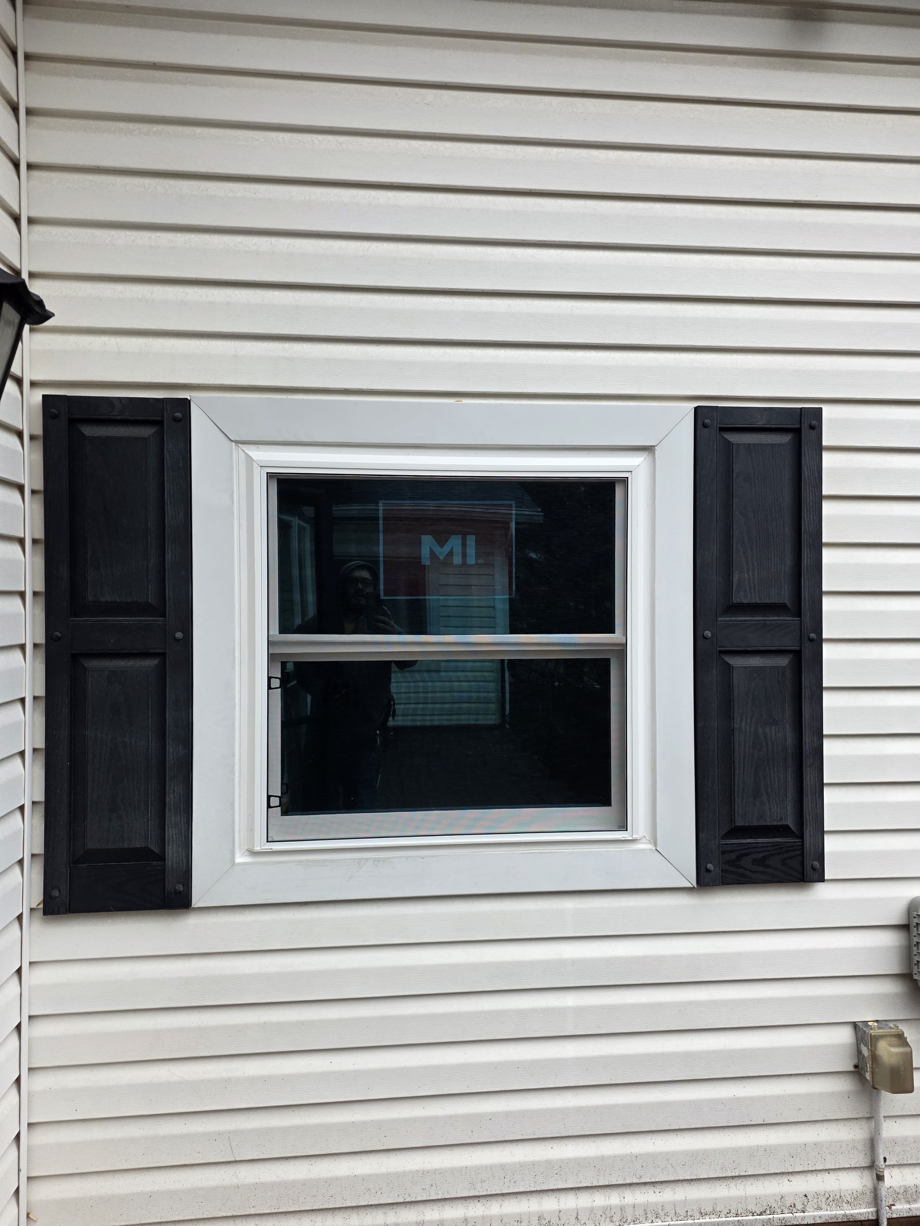 New MI Windows double-hung installed on exterior with vinyl siding and black shutters, Rockland County NY