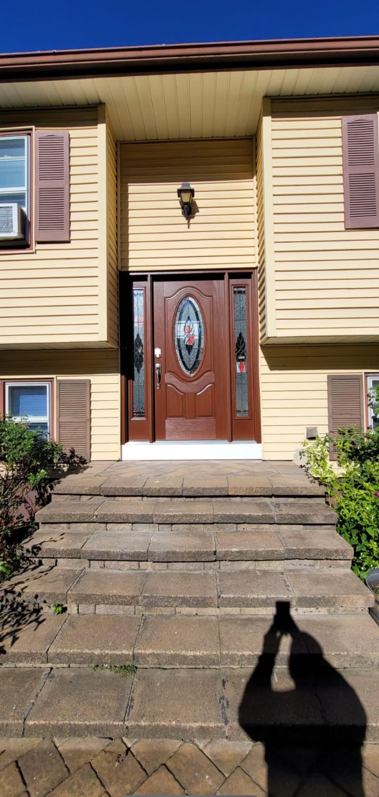 New decorative mahogany entry door with oval glass insert and sidelights, Rockland County NY